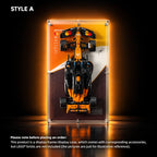 LEGO McLaren MCL39 F1 car (42228) mounted on an orange wall display frame with a clear acrylic dust cover.